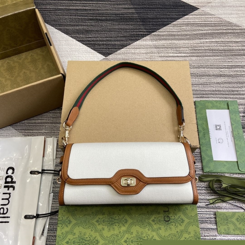 G*u*i top handle bags
